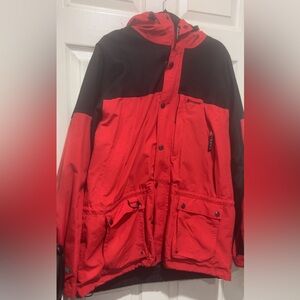 Stearns red & black waterproof jacket with hood and multiple pockets. Size: XL